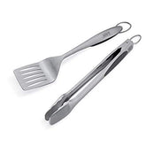 Weber espátula y pinzas frontal paquete mostrando diseño y acabado, fácil agarre