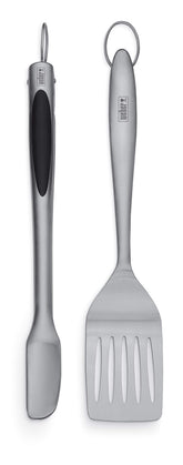 Weber juego frontal con espátula y pinzas mostrando diseño elegante y duradero