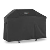 Weber funda frontal sobre Genesis 300 protegiendo la parrilla de suciedad