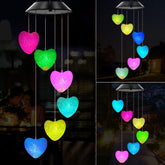 WENANA corazon frontal mostrando diseño ornamental y atractivo nocturno