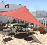 Yardmaker frontal de la vela triangular protege la terraza del sol