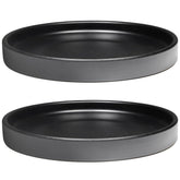 Yukfona platillo frontal negro protegiendo superficie elegante