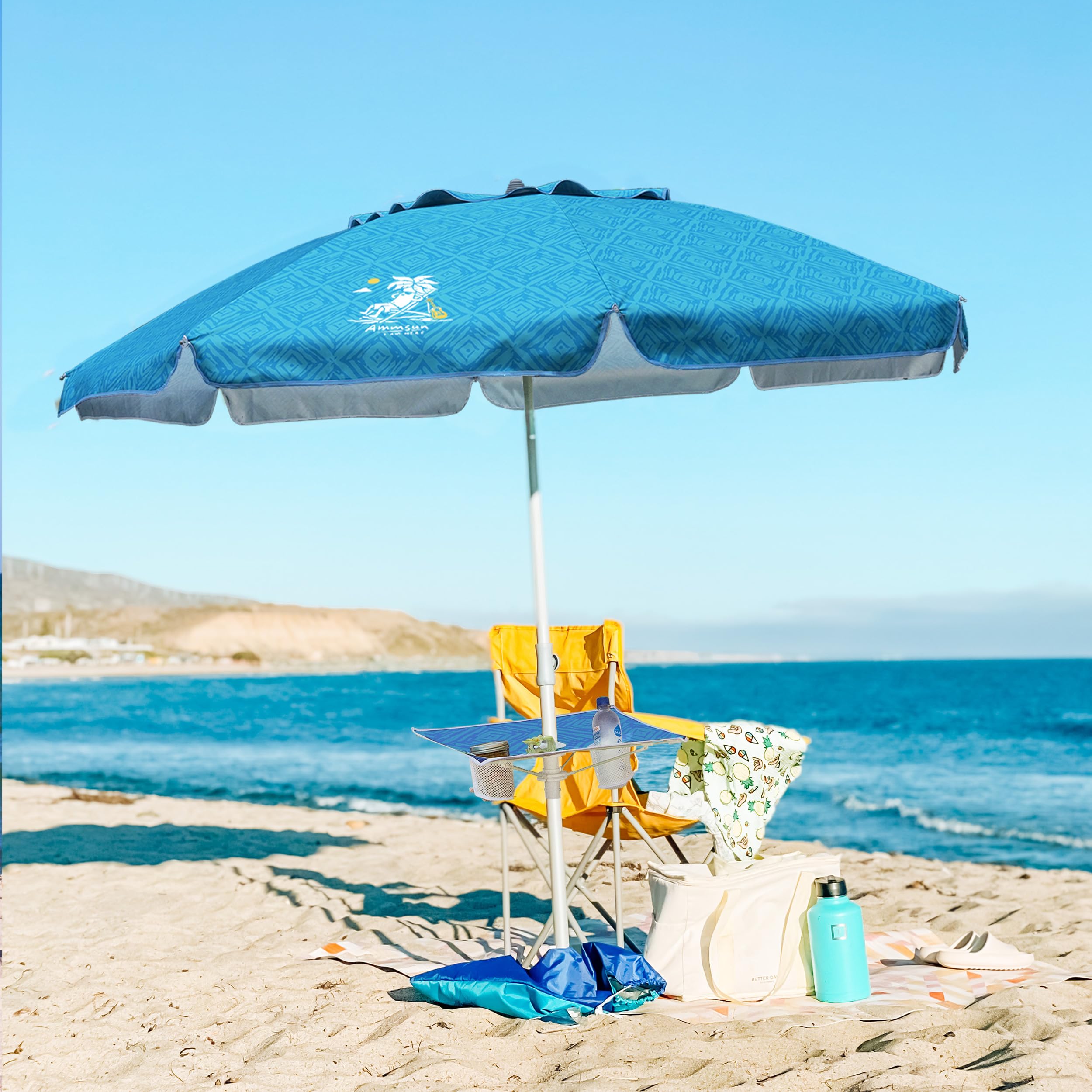 AMMSUN sombrilla instalada en la playa con familia, crea sombra amplia y estable