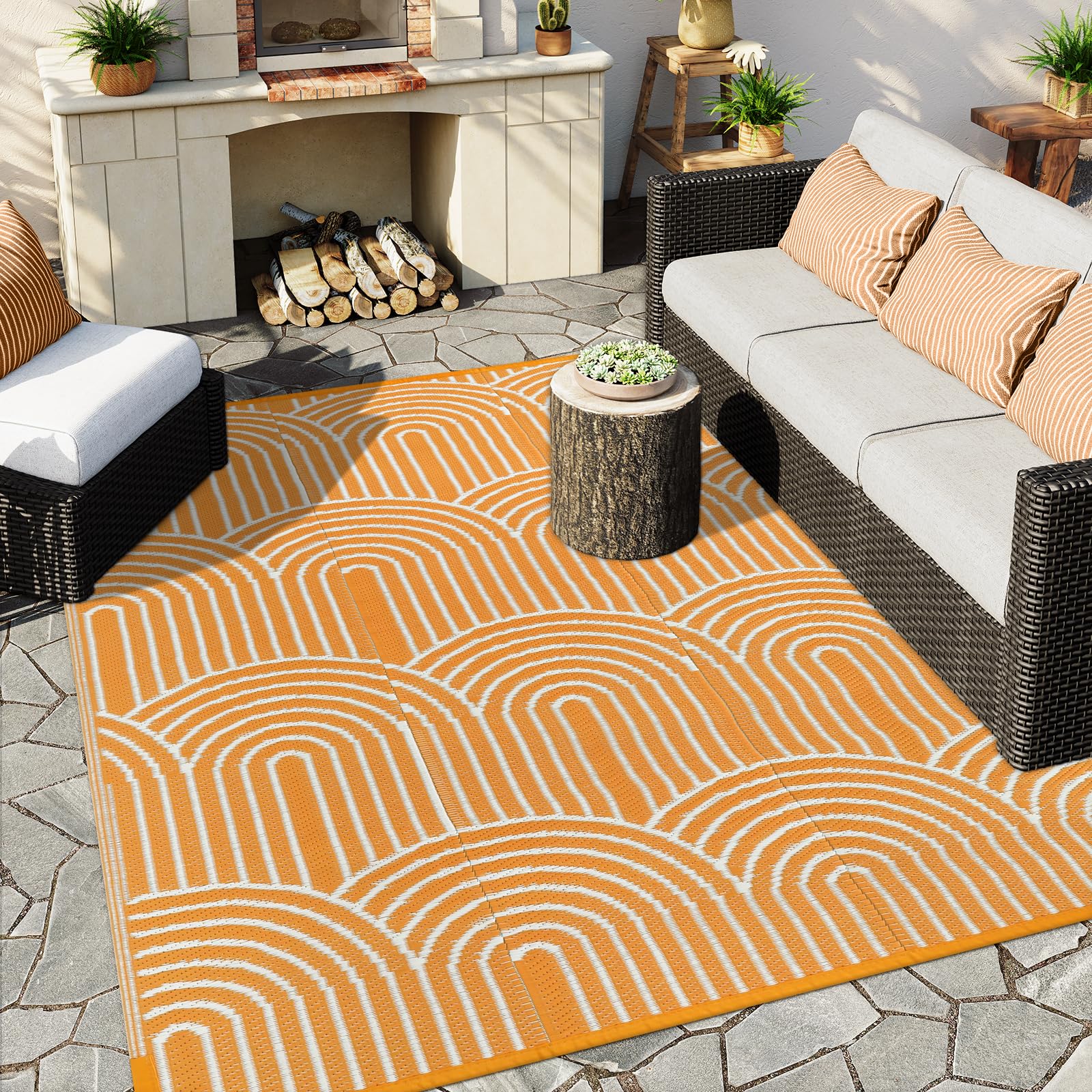Alfombra Anidaroel vista frontal con patrón arcoíris, añade color al patio