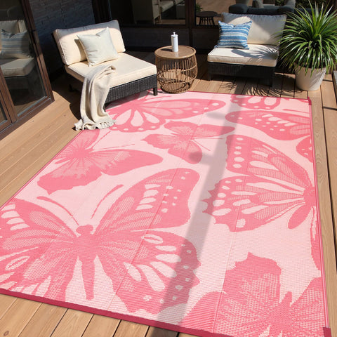Anidaroel vista frontal de la alfombra rosa mariposa mostrando diseño y tamaño