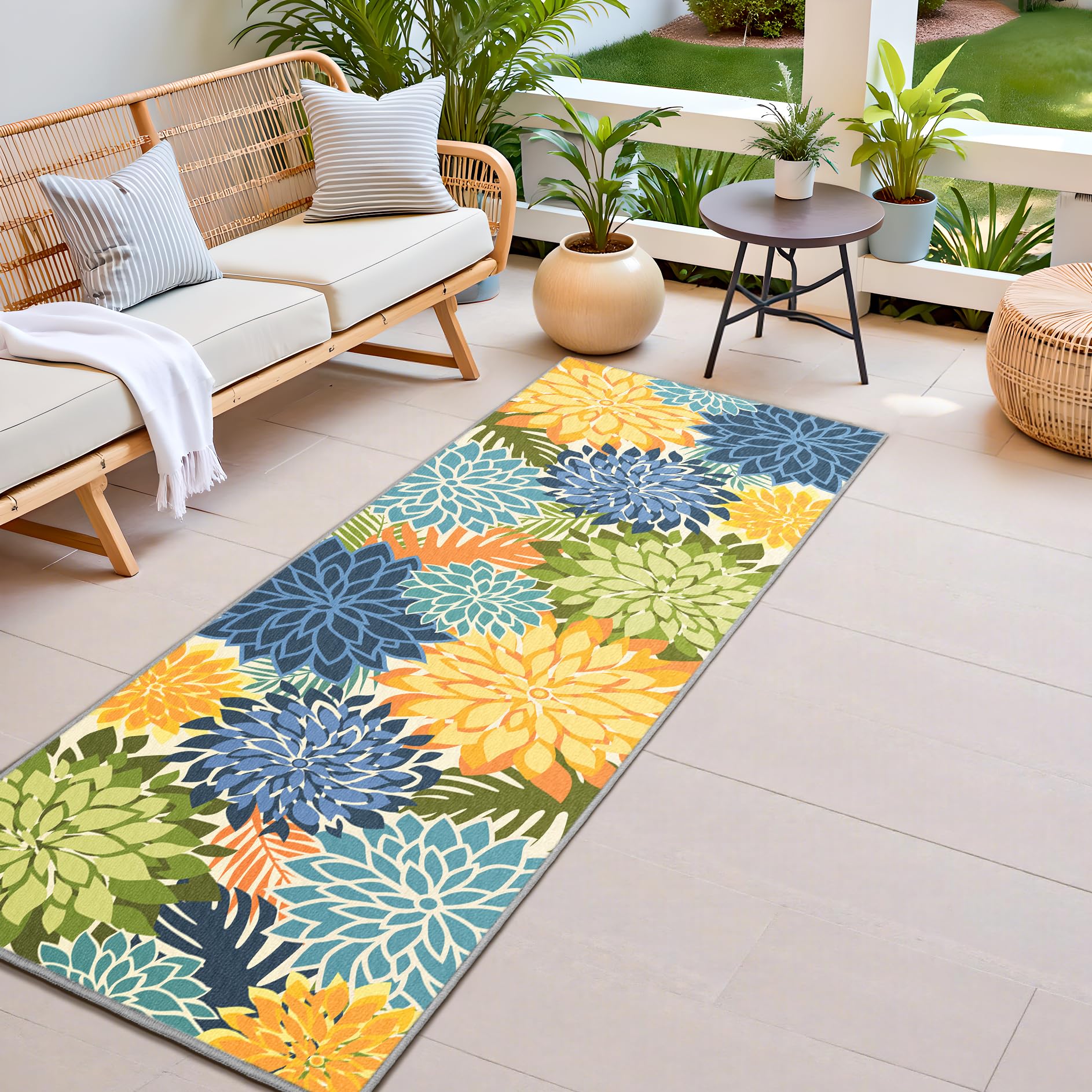 Arenarug alfombra exterior frontal mostrando diseño floral y durabilidad