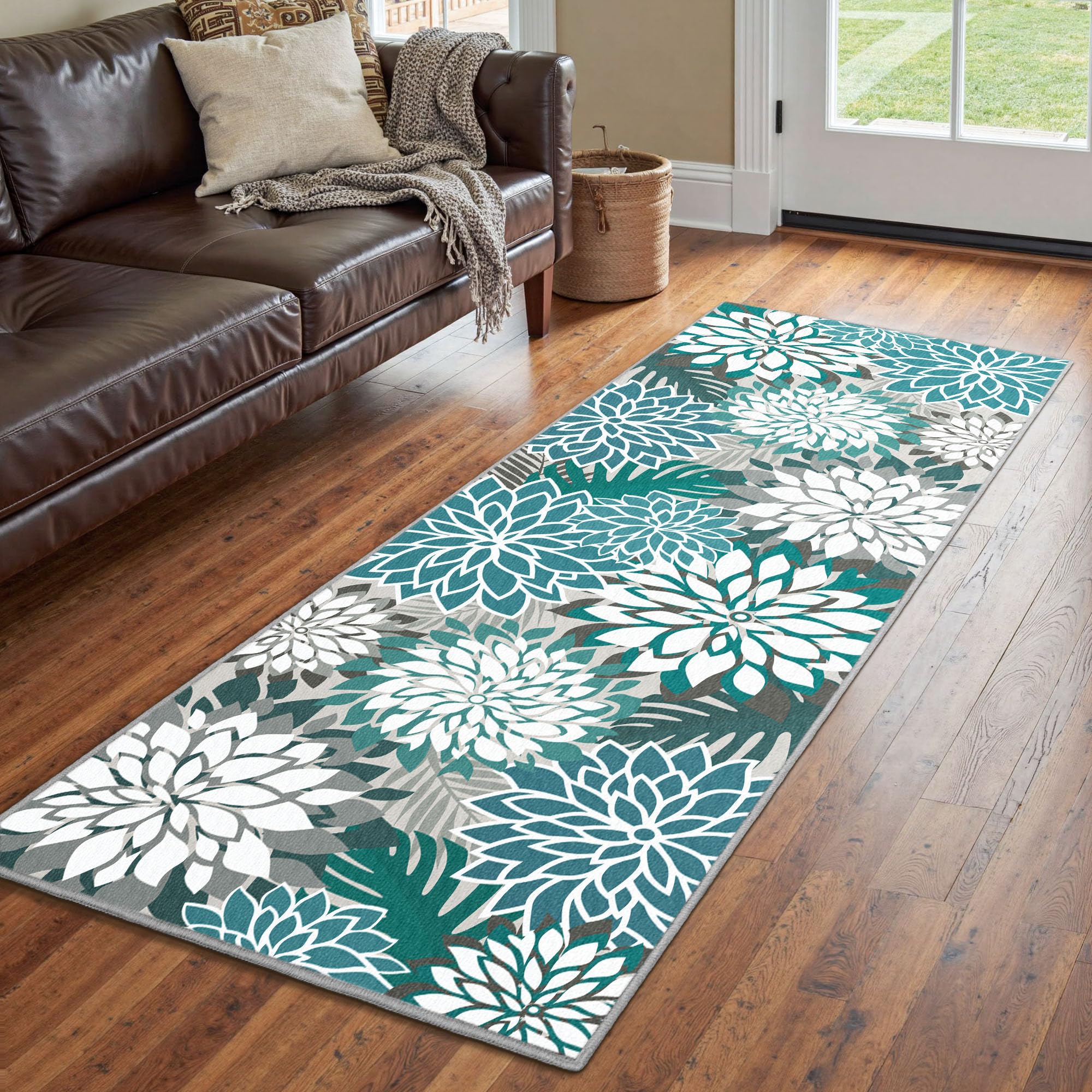 Arenarug alfombra siendo enjuagada con manguera para limpieza rápida