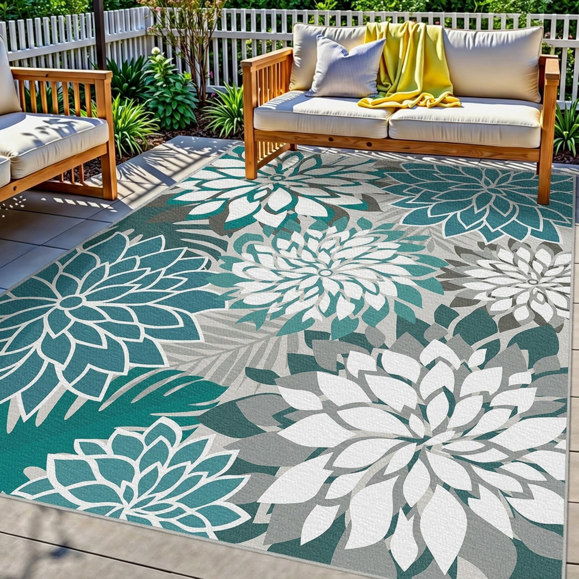 Arenarug vista frontal de la alfombra teal mostrando patrón floral y beneficio estético