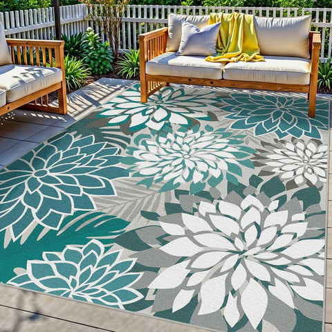 Arenarug vista frontal de la alfombra teal mostrando patrón floral y beneficio estético