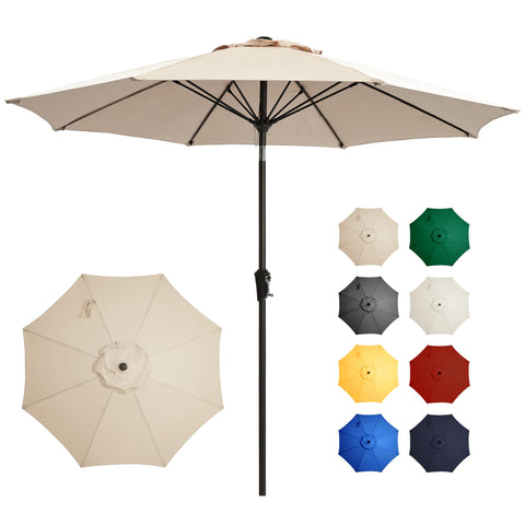 Ayge vista frontal de la sombrilla beige protegiendo mesa de exterior