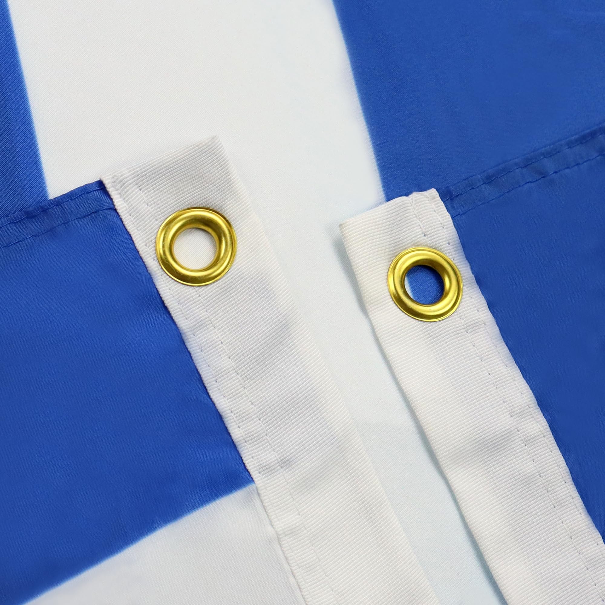 AZ FLAG detalle de costuras reforzadas mostrando durabilidad del borde