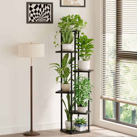 Bamworld soporte en uso en salón con macetas, aporta orden y estilo