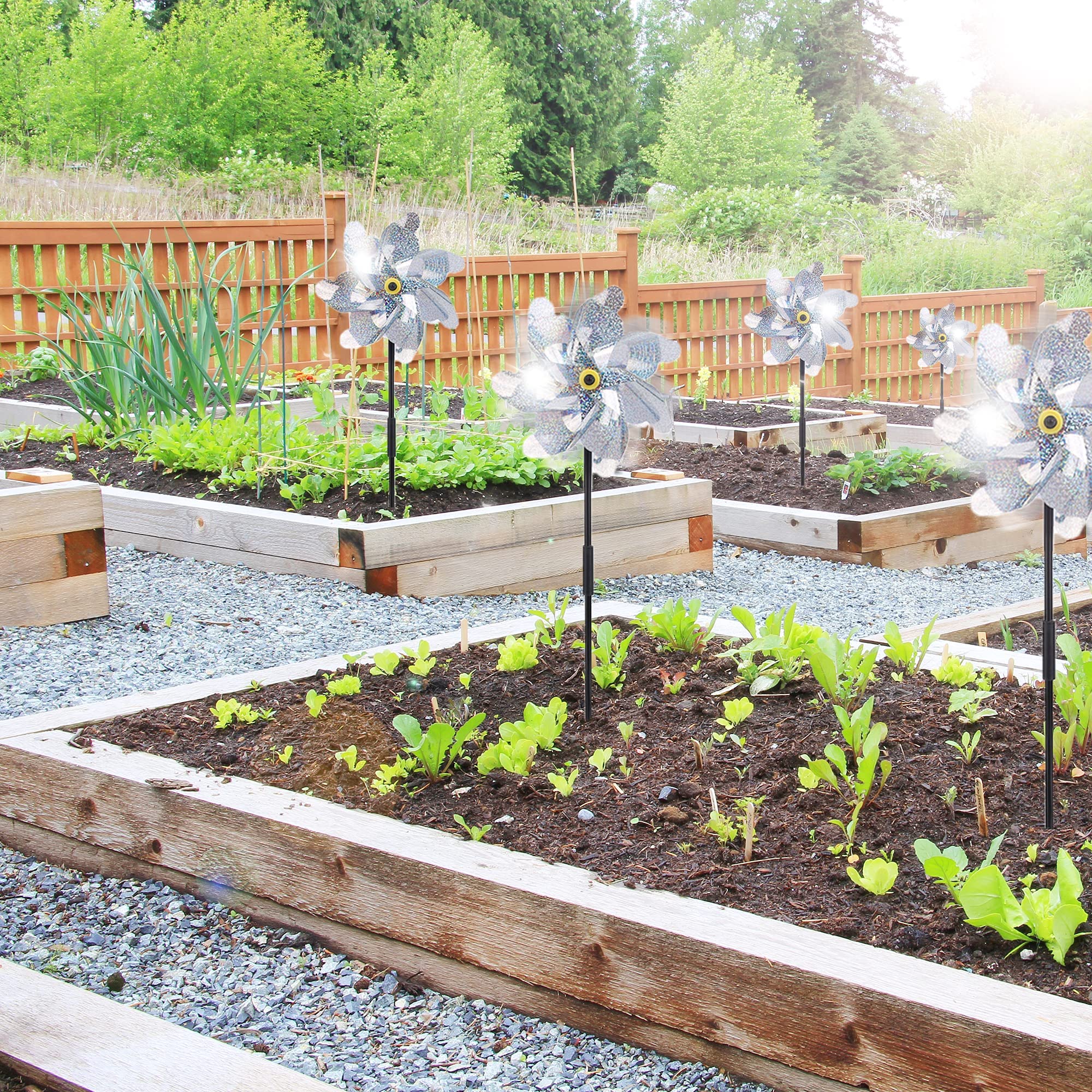BATTIFE conjunto de varios molinetes en jardín señalizando cultivos y decoración