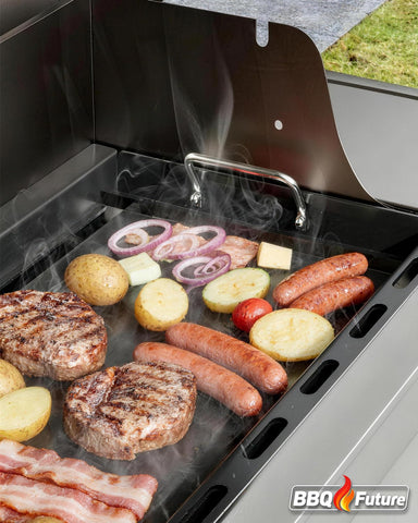 BBQ Future plancha junto a espátula para apreciar escala real