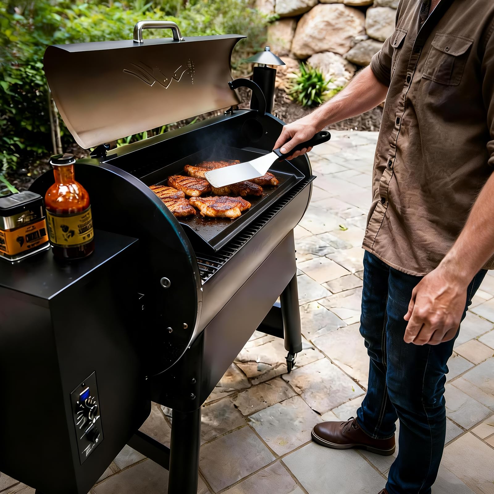 BBQ Future plancha colocada en parrilla de gas preparando comida