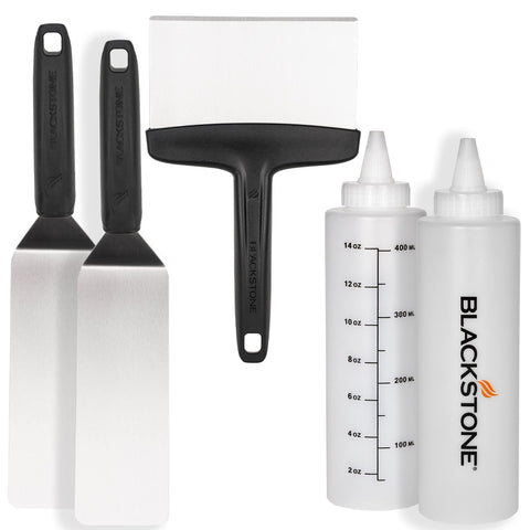 BLACKSTONE kit frontal con las cinco piezas mostrando espátulas, rasqueta y biberones, utilidad inmediata