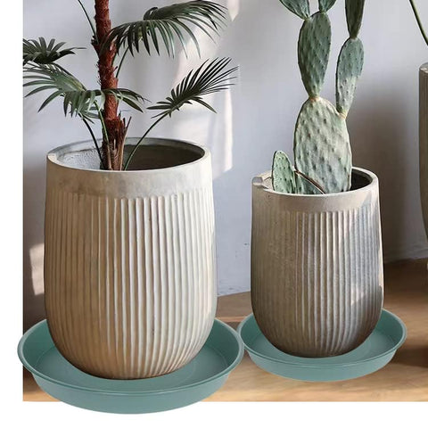 Bleuhome plato con maceta protegiendo suelo interior