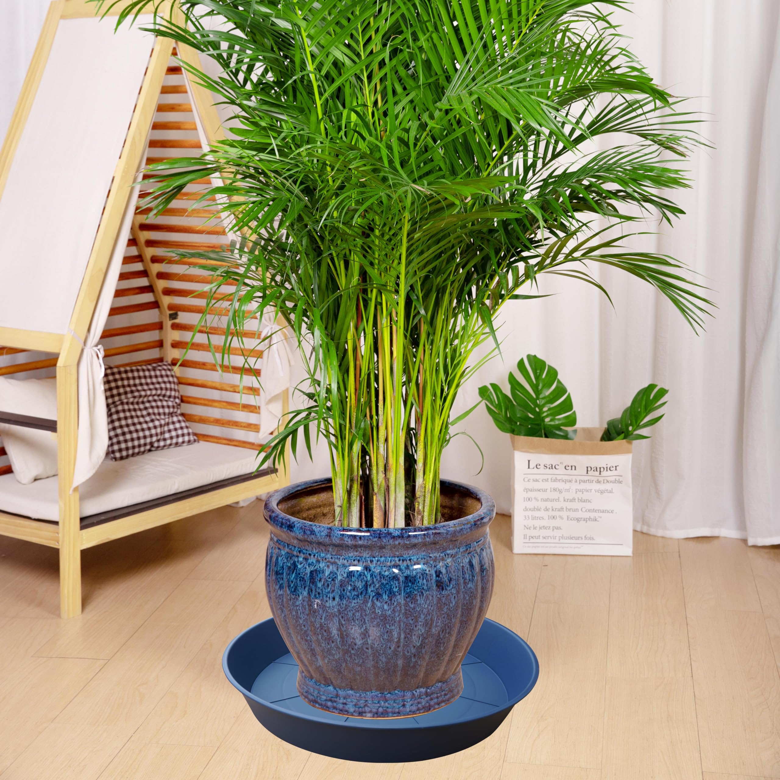 Bleuhome plato con maceta en uso, recoge drenaje eficientemente