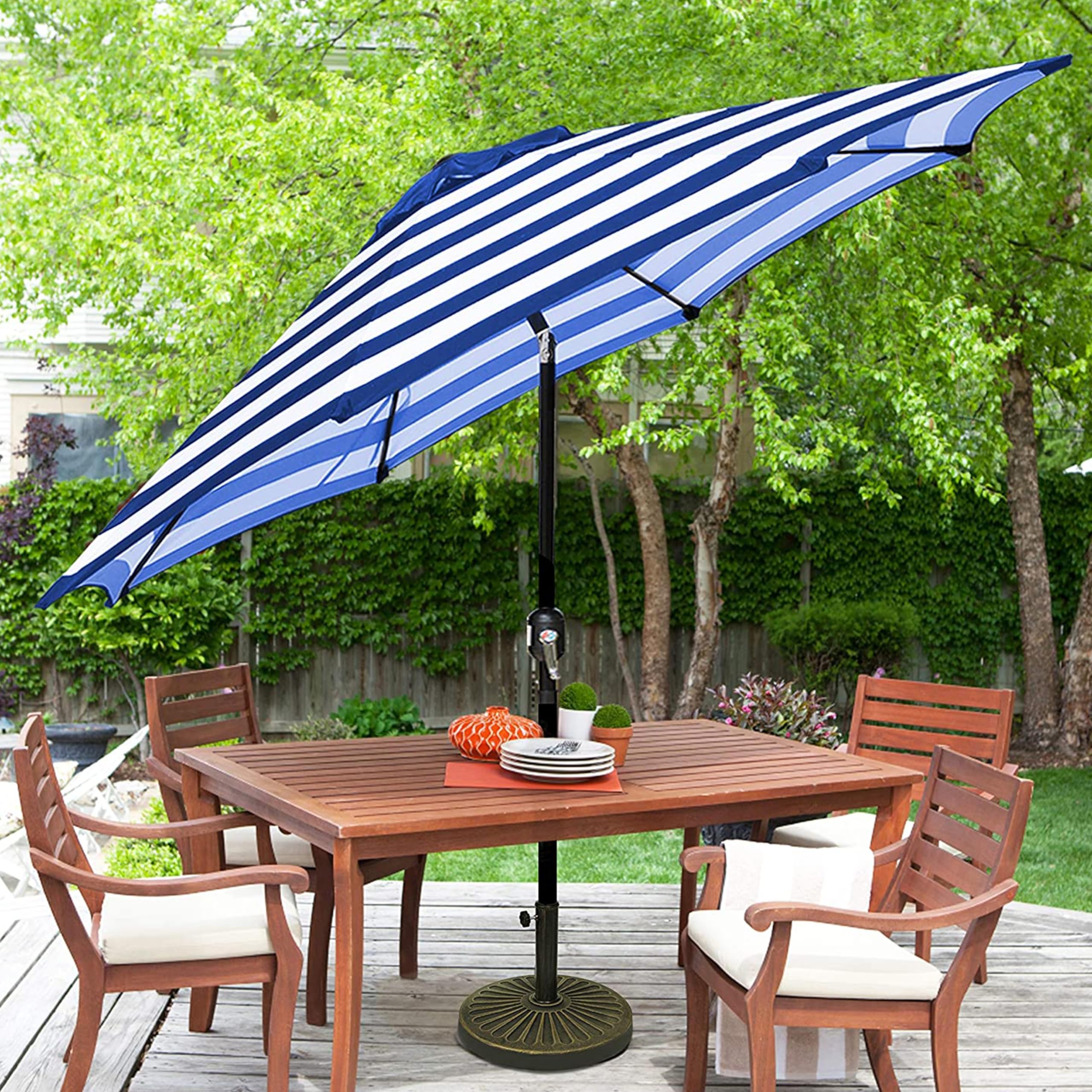 Blissun sombrilla sobre mesa 42-54" mostrando cobertura para 4-6 personas