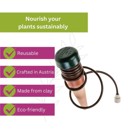 Blumat varias estacas en una jardinera mostrando distribución uniforme de agua