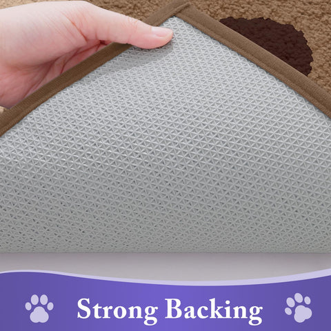 Buganda felpudo colocado en entrada para mantener suelos limpios