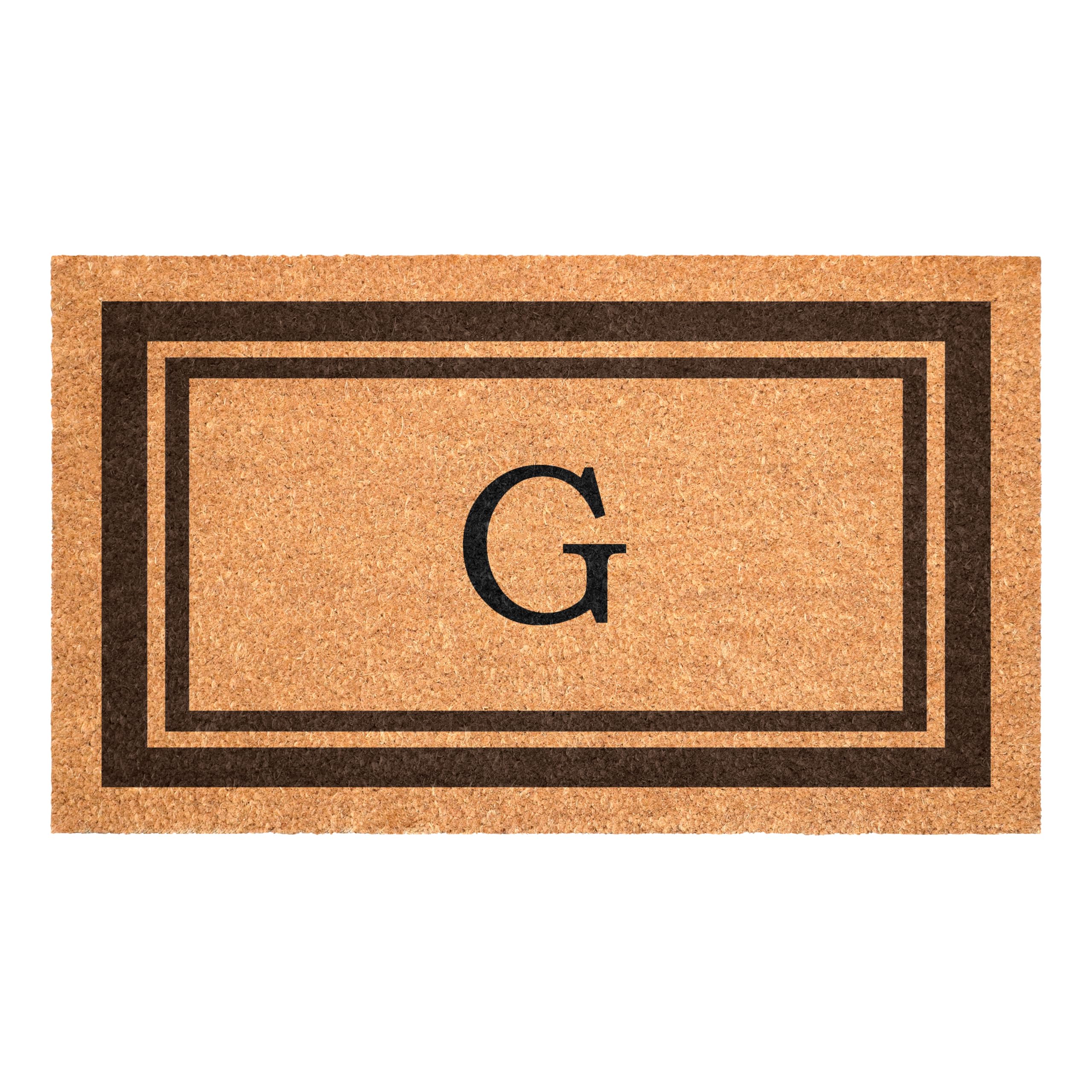 Calloway Mills felpudo frontal mostrando monograma G y borde doble, entrada limpia