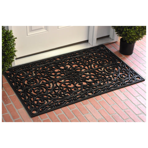 Calloway Mills felpudo Gatsby junto a puerta mostrando protección contra suciedad