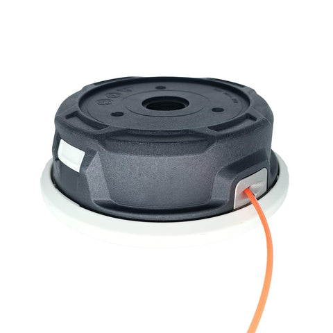 Carburionix cabezal C26-2 montado en desbrozadora en uso y corte limpio