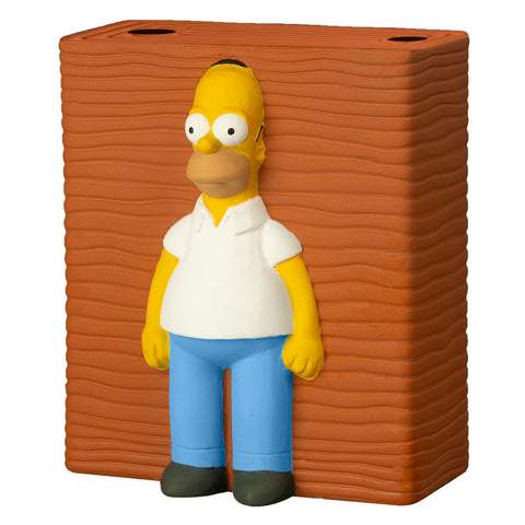 Homer Chia Pet en un escritorio decorativo Chia aporta humor y verdor al espacio de trabajo