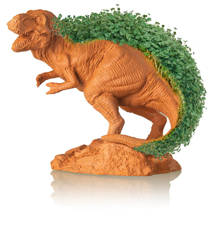 Chia T‑Rex comparado con una taza para mostrar tamaño real