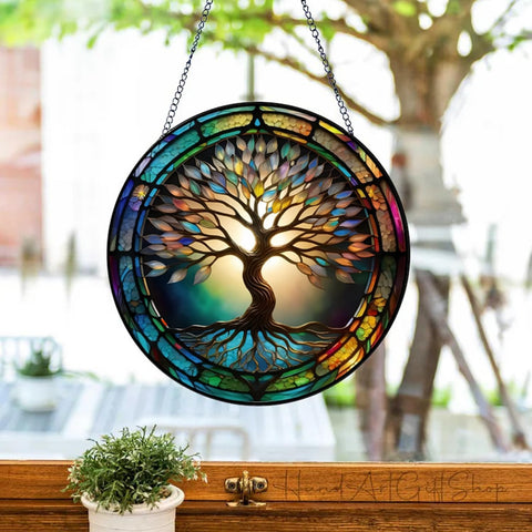Generic Colorful Tree of Life Suncatcher colgado en ventana creando reflejos arcoíris