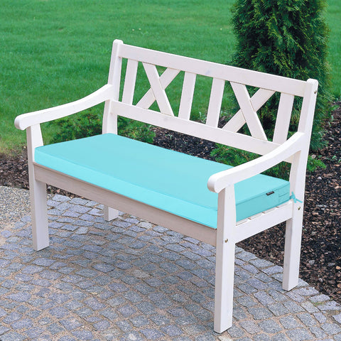 Comcaver cojín usado en patio junto a mesa para ambiente de descanso