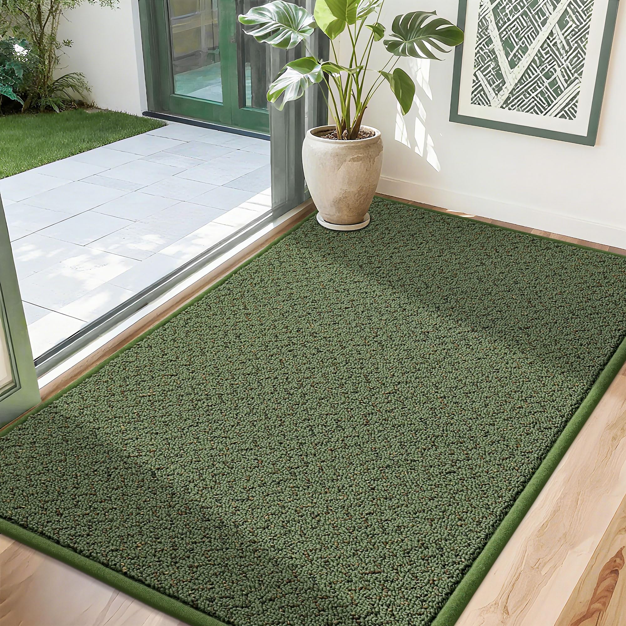 COSY HOMEER felpudo frontal mostrando diseño verde y beneficio de captura