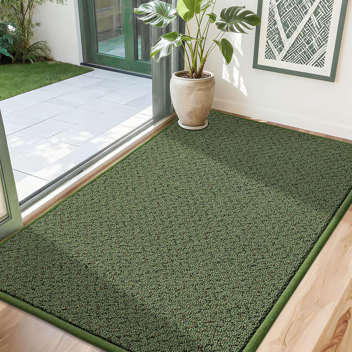 COSY HOMEER felpudo frontal mostrando diseño verde y beneficio de captura