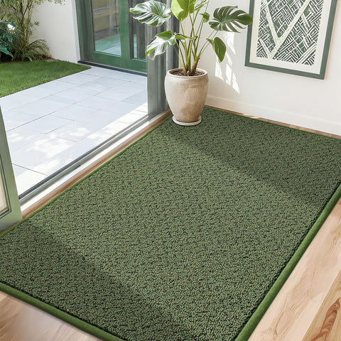 COSY HOMEER felpudo frontal mostrando diseño verde y beneficio de captura