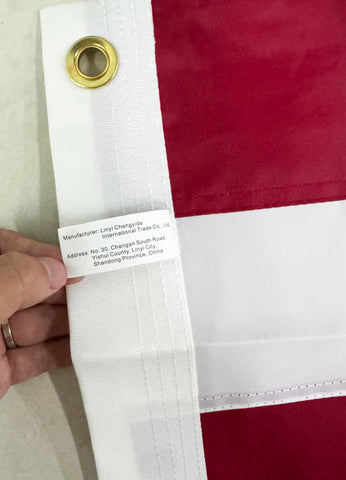 DANF FLAG comparación de tamaño en mano para referencia práctica