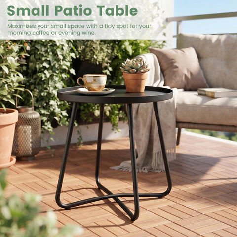 danpinera mesa en patio con plantas que destaca su uso exterior y estilo