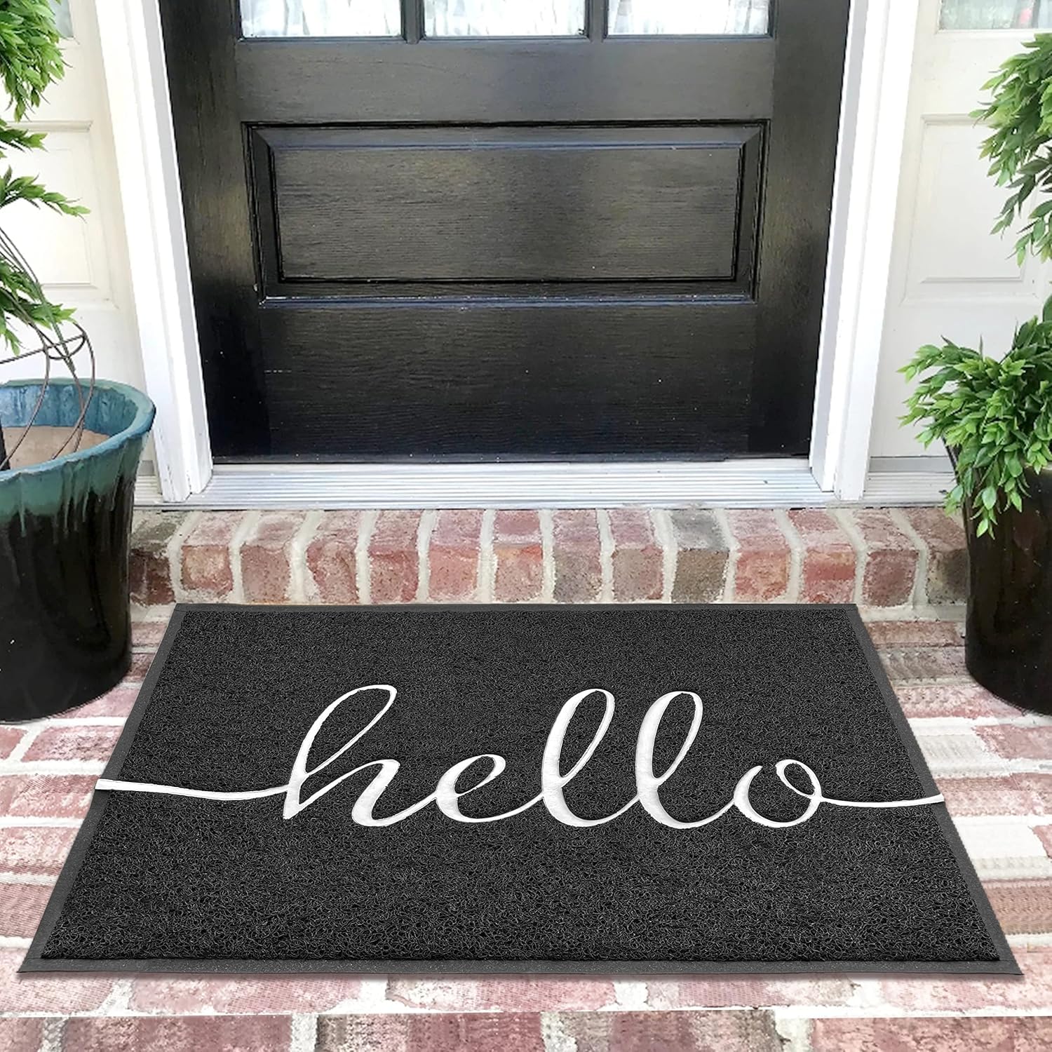 EARTHALL felpudo frontal mostrando diseño hello y bienvenida durable