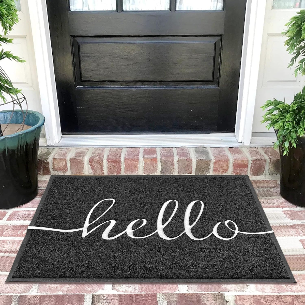 EARTHALL felpudo frontal mostrando diseño hello y bienvenida durable