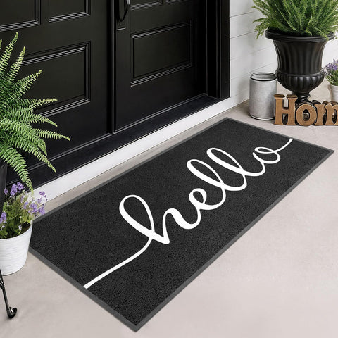 EARTHALL felpudo frontal mostrando diseño "Hello" y bienvenida duradera