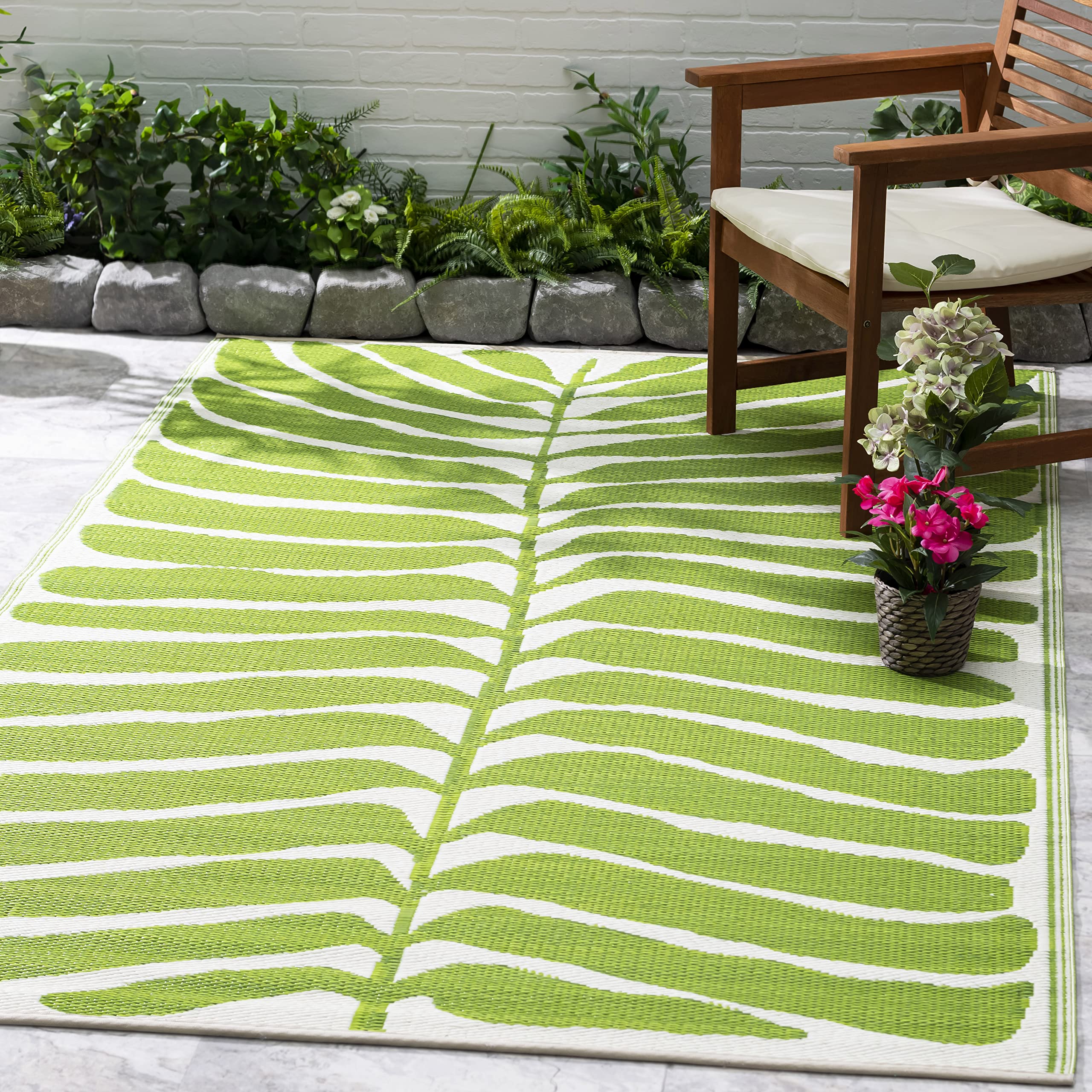 Fab Habitat alfombra frontal verde mostrando diseño tropical y beneficio estético