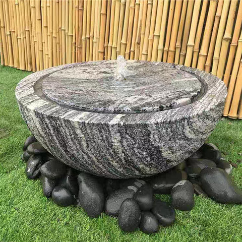 FANTIAN piedras alrededor de estanque aportando aspecto natural y estabilidad