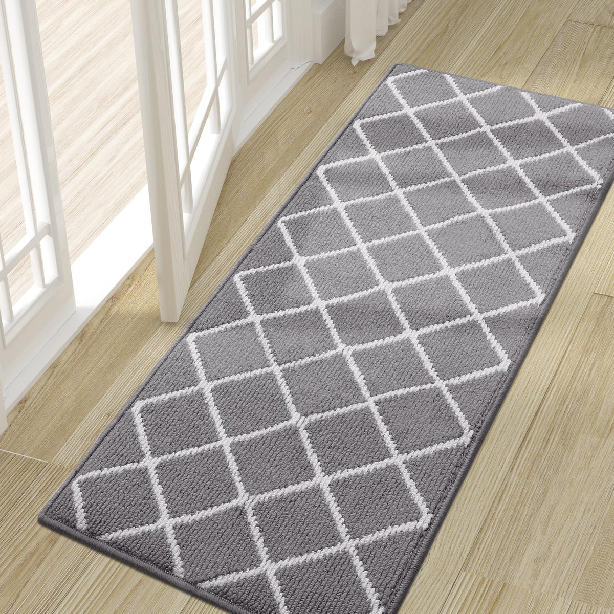 Felpudo Finchitty frontal en entrada que protege suelos y absorbe humedad