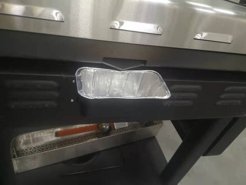 Firsgrill cubeta en uso en plancha Blackstone reduciendo salpicaduras