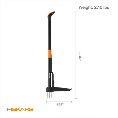 Fiskars comparación de tamaño del arrancador junto a una persona