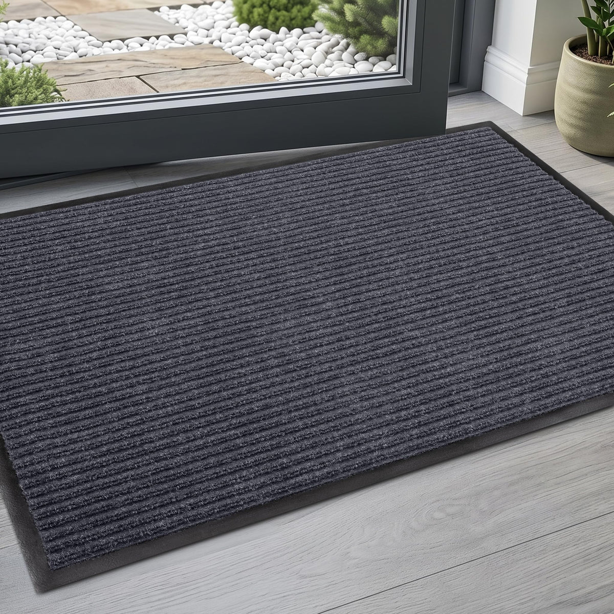 FloorGuard felpudo frontal con diseño gris y beneficio limpieza eficaz