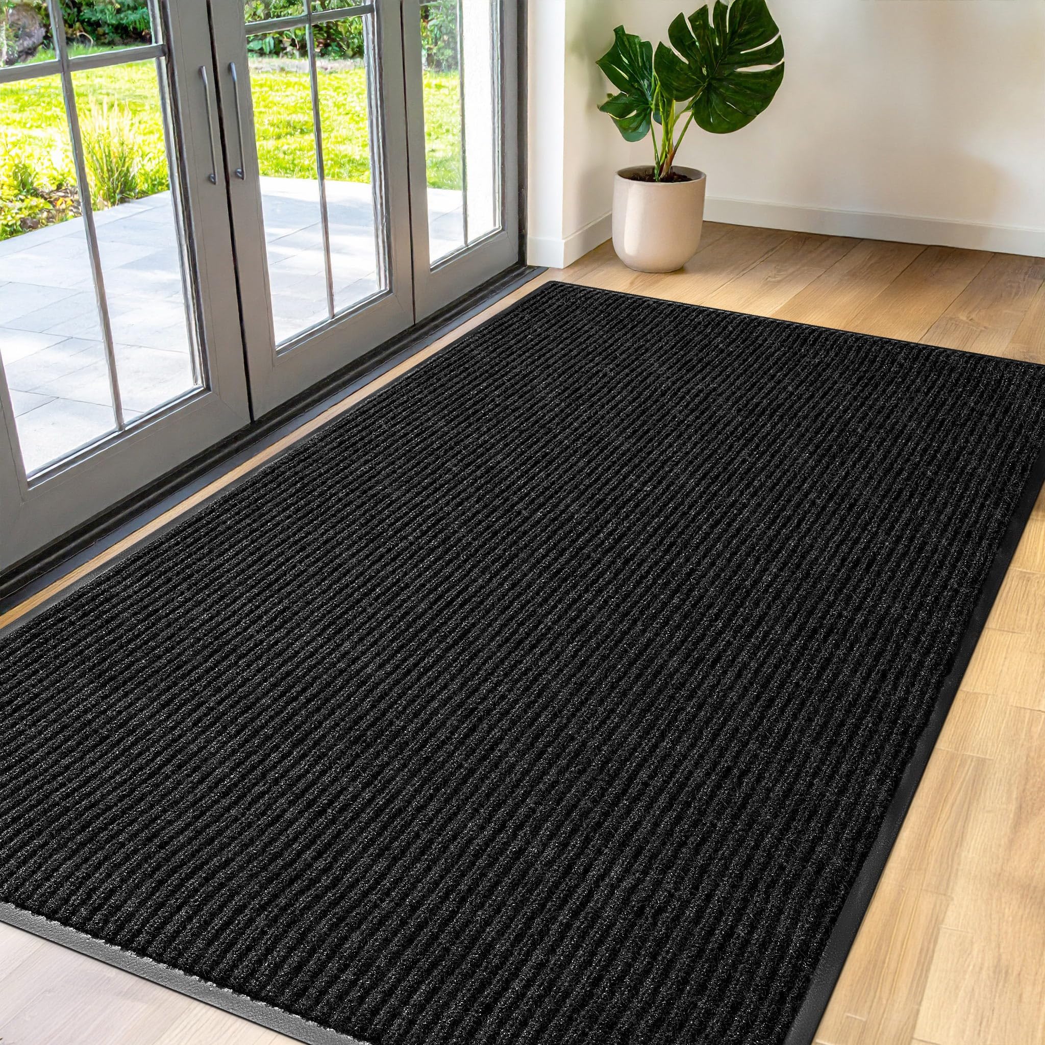 FloorGuard vista frontal del tapete grande mostrando diseño y tamaño práctico