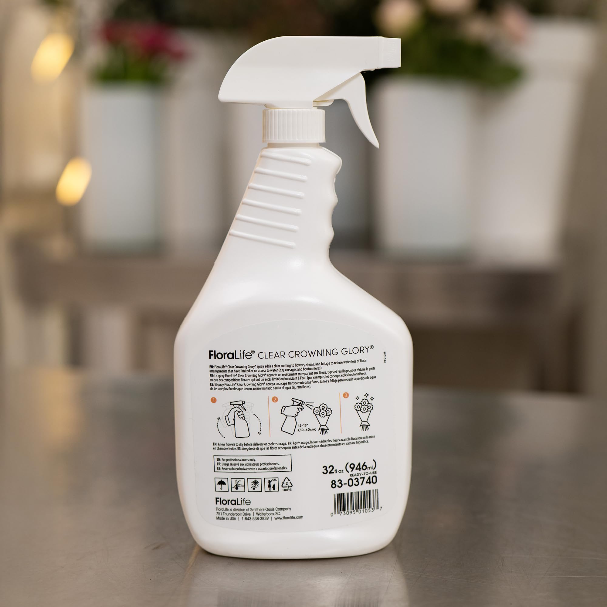 FloraLife envase junto a una regla para comparar el tamaño práctico de 32 fl oz