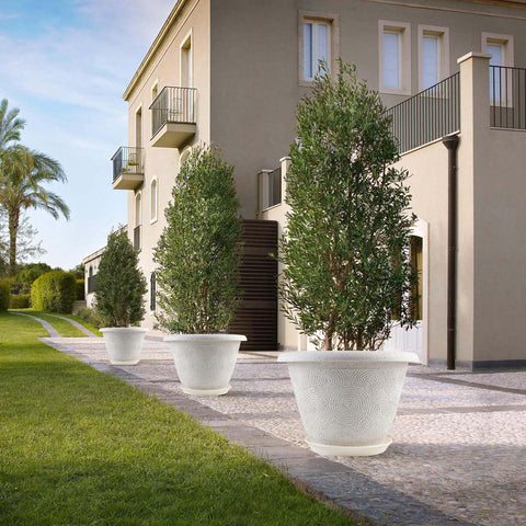 Fodetyff pack de 4 macetas distribuidas decorando balcón o jardín