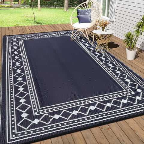 Garvee vista frontal de la alfombra 8x10 mostrando color negro y azul, estilo moderno